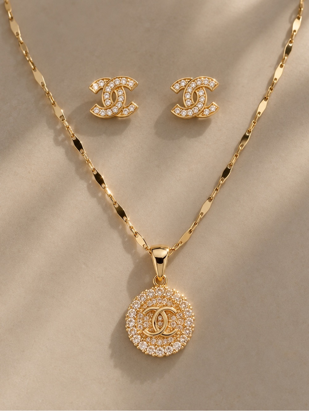 Gold Crystal CC Pendant Necklace and Stud Earrings Set
